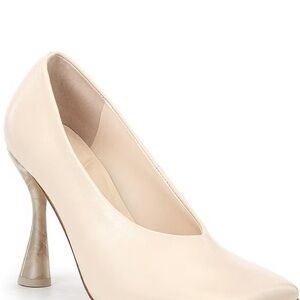 Square toed cream heels with champagne color heel.